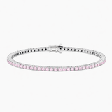 Silver bracelet with pink gemstones on a white background